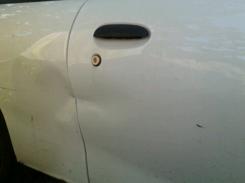 someone backed into my car and dented the passenger door and right-rear quarter panel